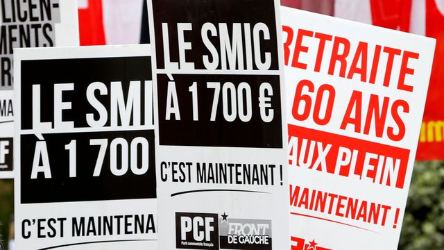 photo-d-illustration-le-1er-mai-2013-a-paris-le-pcf-et-le-front-de-gauche-demandent-un-smic-a-1700-euros_5754317.jpg